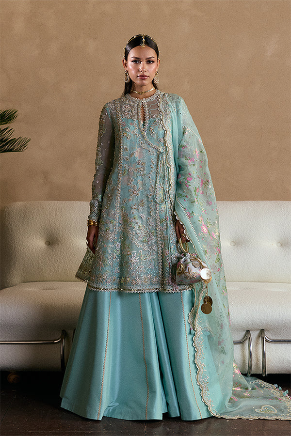 Model Wearing Suffuse by Sana Yasir Illyra Aquamarine Angrakha with Sharara Pants for Wedding Wear - Pakistani Designer wear for Women in UK | Kifat