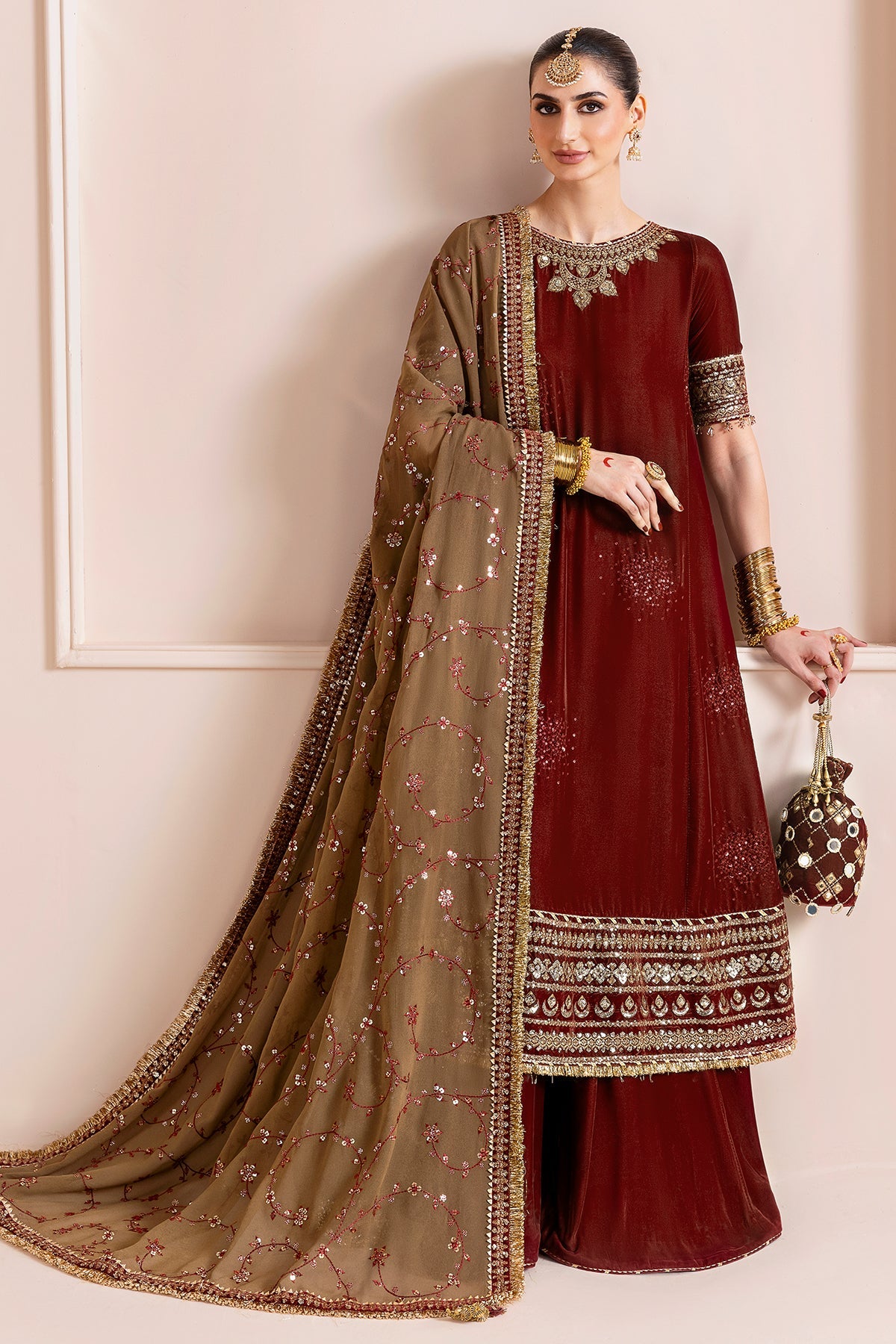 Women Wearing Embroidered Velvet Formal CVF D-13 Rust Long Shirt with Sharara for Wedding Events - Pakistani Designer Wear for Women in UK | Kifat