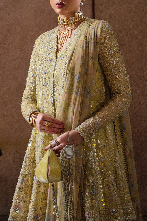 Model Wearing Suffuse by Sana Yasir Merivah Butter Yellow Peplum with Sharara Pants for Wedding Wear - Pakistani Designer wear for Women in UK | Kifat