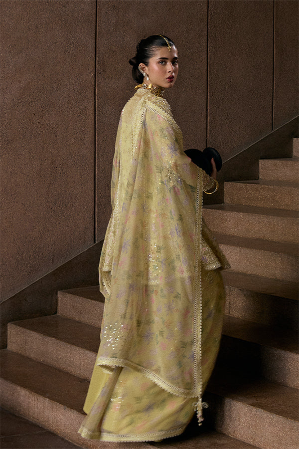 Model Wearing Suffuse by Sana Yasir Merivah Butter Yellow Peplum with Sharara Pants for Wedding Wear - Pakistani Designer wear for Women in UK | Kifat