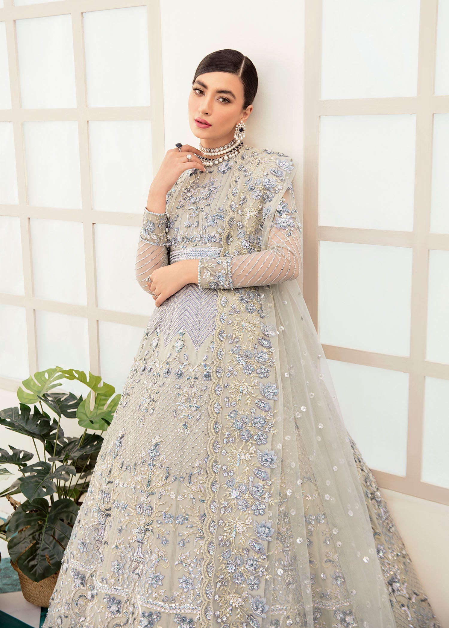 Women Wearing Hanzel Silver Lehnga For Bridals Events - Pakistani Designer Wear For Women In UK | Kifat