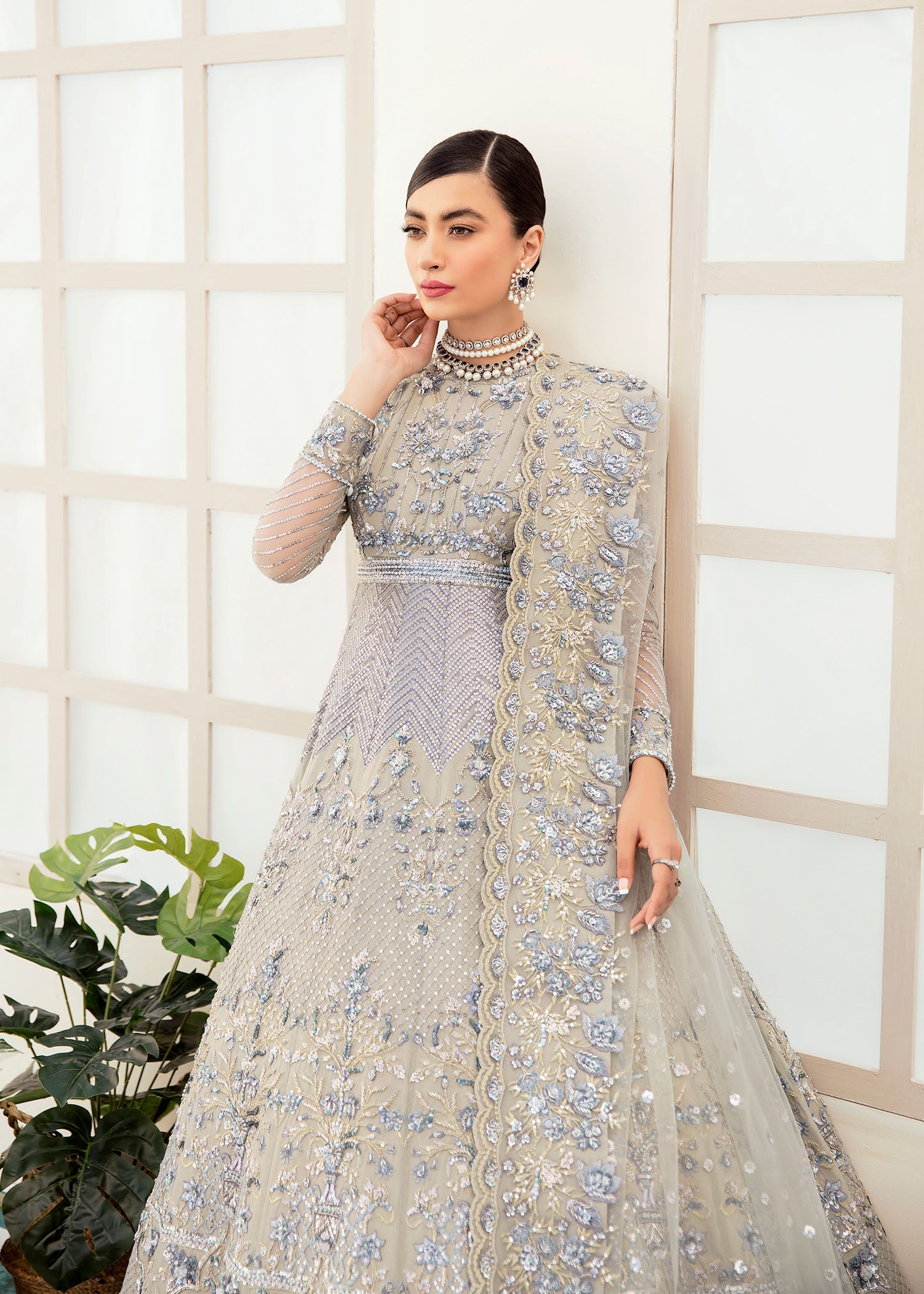 Women Wearing Hanzel Silver Lehnga For Bridals Events - Pakistani Designer Wear For Women In UK | Kifat