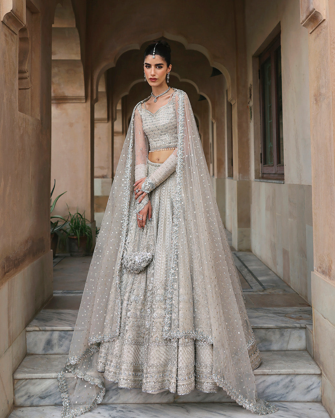 Model Wearing Faiza Saqlain Cammi White Lehnga Choli for wedding wear - Pakistani Designer Wear for Women in UK | Kifat