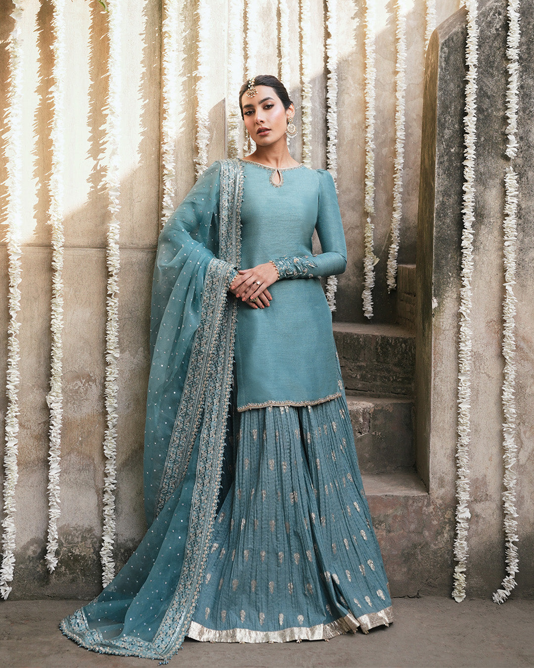 Model Wearing Faiza Saqlain Tisha Cadet Blue Shirt with Sharara for wedding wear - Pakistani Designer Wear for Women in UK | Kifat