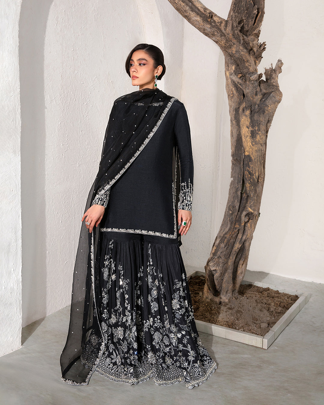 Model Wearing Faiza Saqlain Ciar Black Shirt with Gharara for wedding wear - Pakistani Designer Wear for Women in UK | Kifat