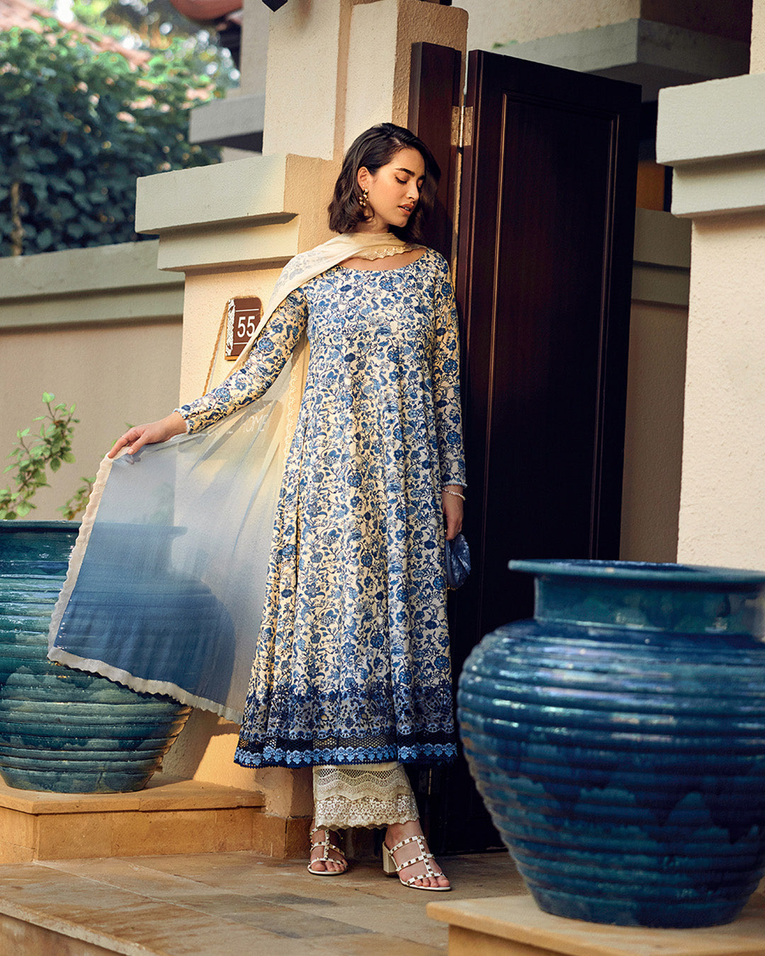 Model Wearing Faiza Saqlain Terylin Off-White & Blue Kalidaar with Culottes for Ladies wear - Pakistani Designer Wear for Women in UK | Kifat