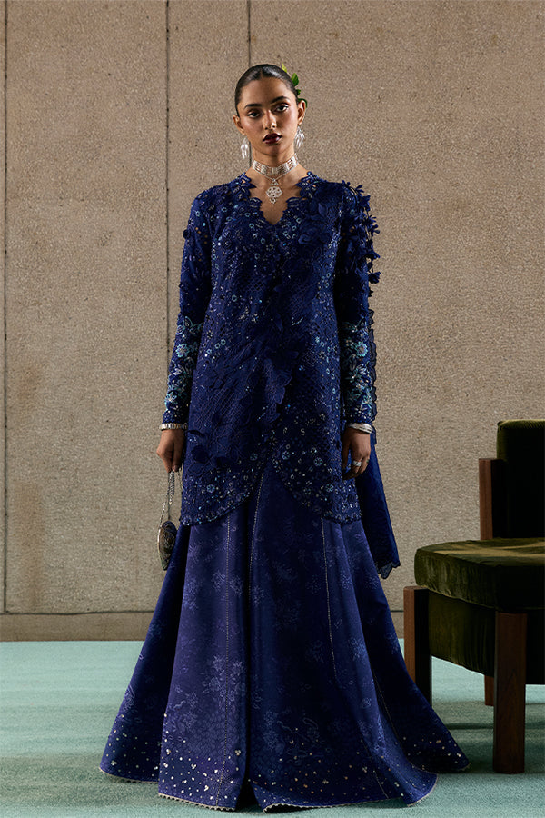 Model Wearing Suffuse by Sana Yasir Freyssa Indigo blue Angrakha with Sharara Pants for Wedding Wear - Pakistani Designer wear for Women in UK | Kifat