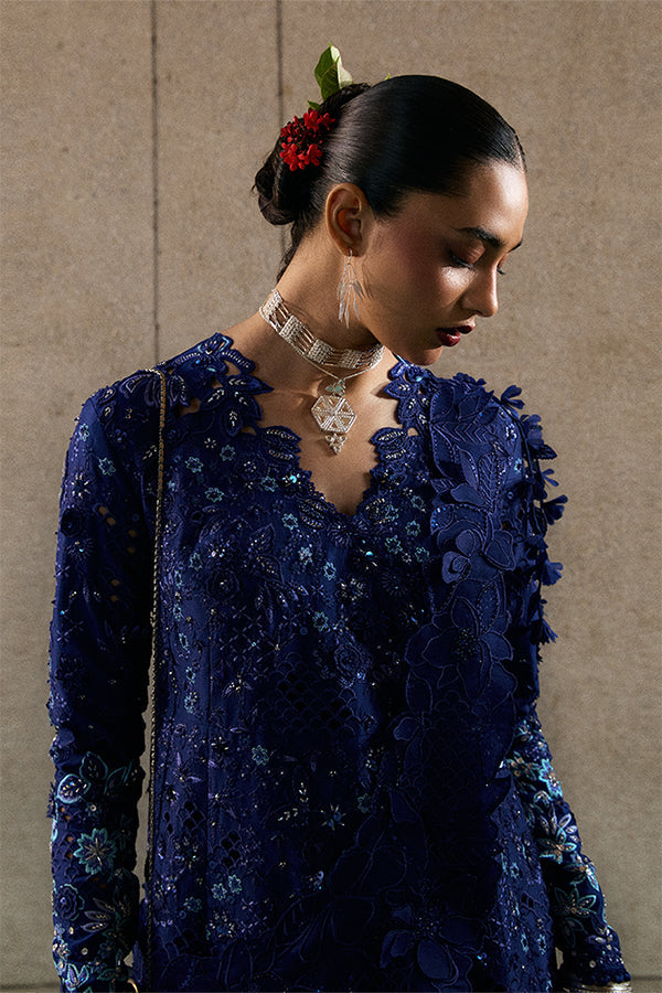 Model Wearing Suffuse by Sana Yasir Freyssa Indigo blue Angrakha with Sharara Pants for Wedding Wear - Pakistani Designer wear for Women in UK | Kifat