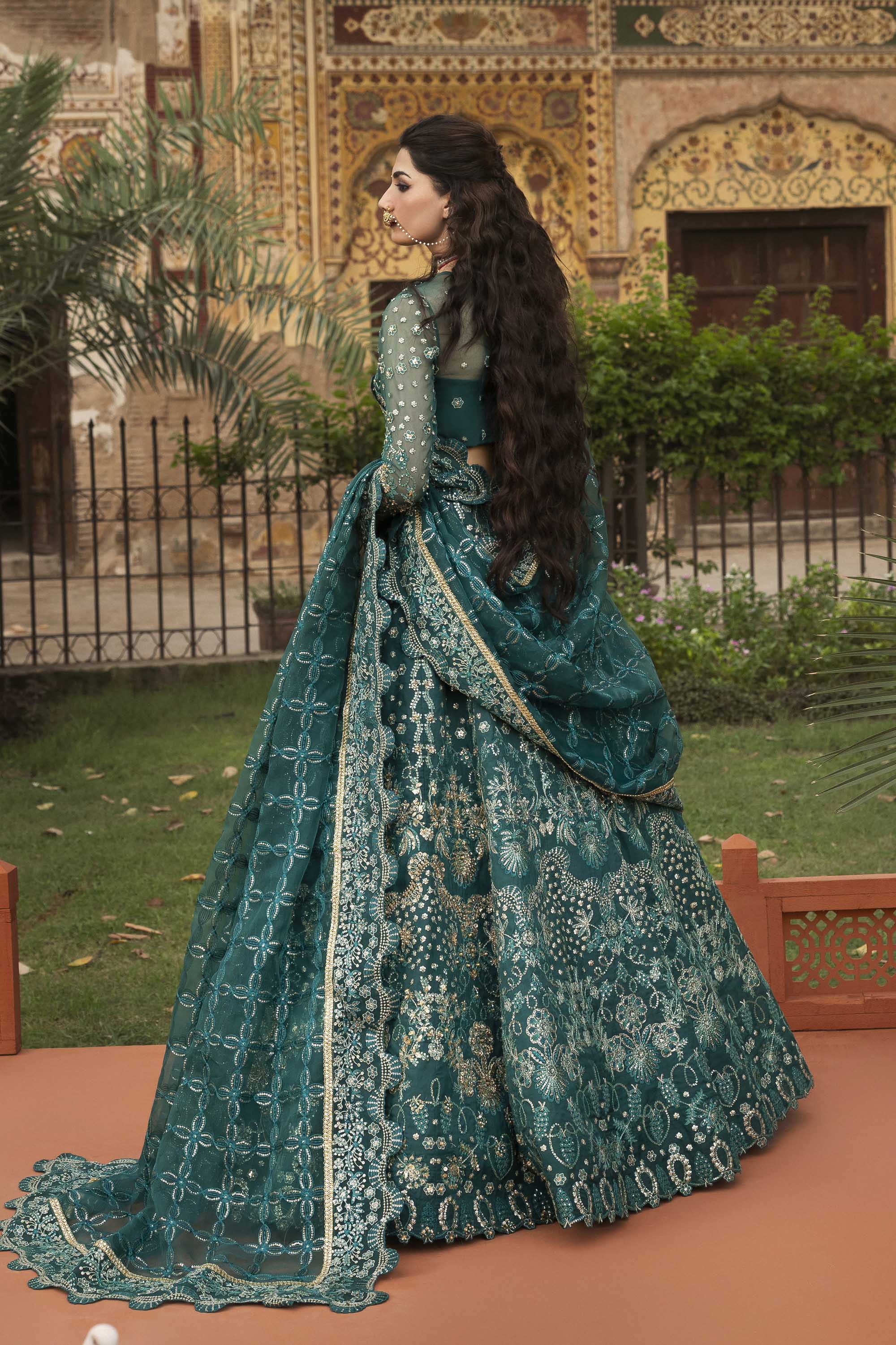 Women Wearing Gulnar Teal Lehnga Choli For Formals Events - Pakistani Designer Wear For Women In UK | Kifat
