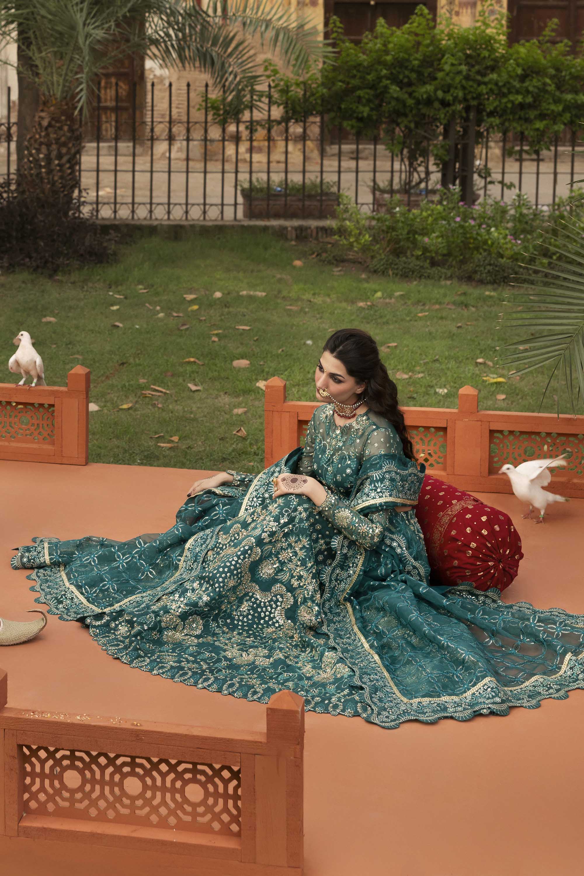 Women Wearing Gulnar Teal Lehnga Choli For Formals Events - Pakistani Designer Wear For Women In UK | Kifat