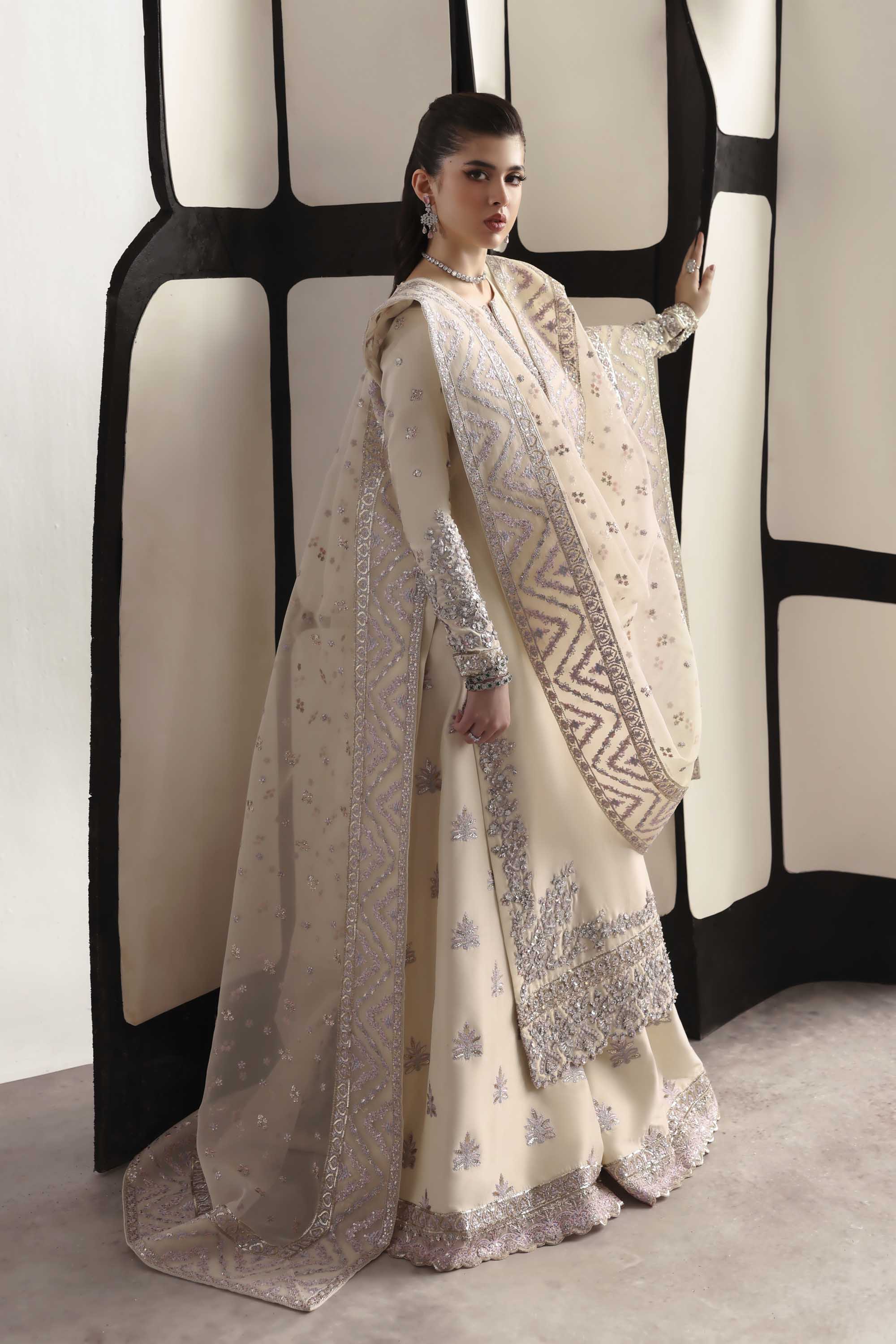 Women Wearing Raue Cream Long Shirt For Luxury Formals Events - Pakistani Designer Wear For Women In UK | Kifat