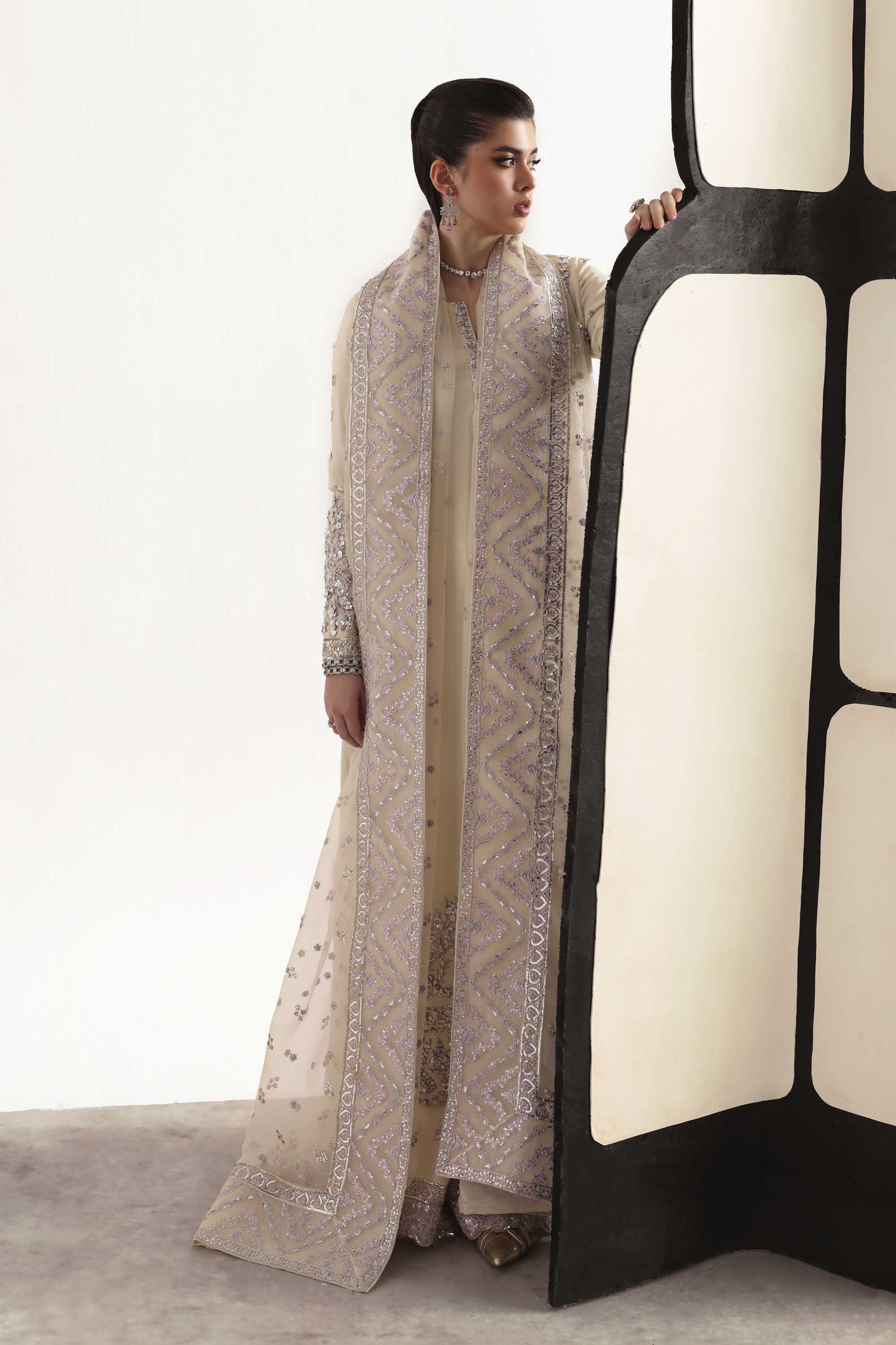 Women Wearing Raue Cream Long Shirt For Luxury Formals Events - Pakistani Designer Wear For Women In UK | Kifat