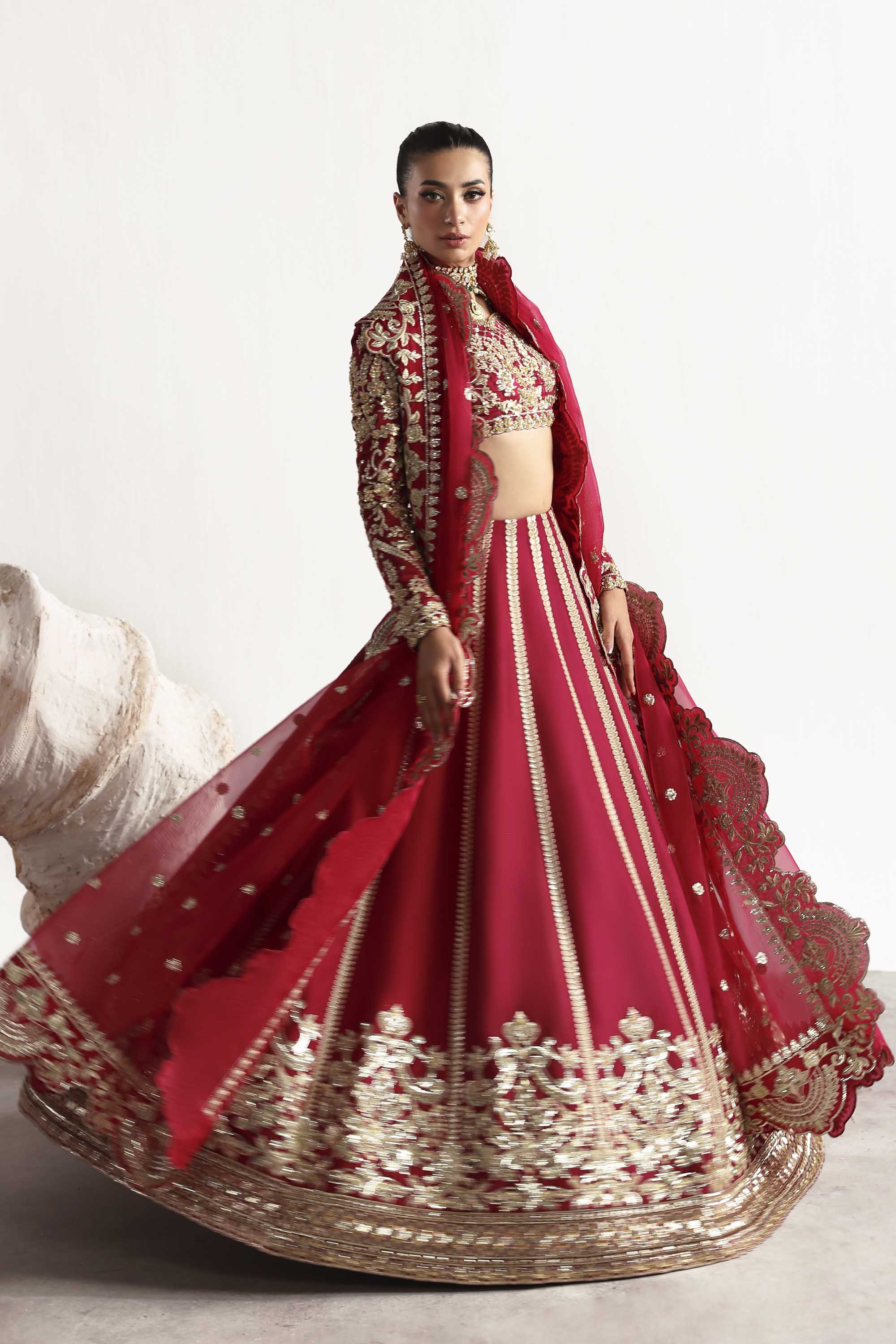 Women Wearing Rouge Red Lehnga Choli For Luxury Formals Events - Pakistani Designer Wear For Women In UK | Kifat