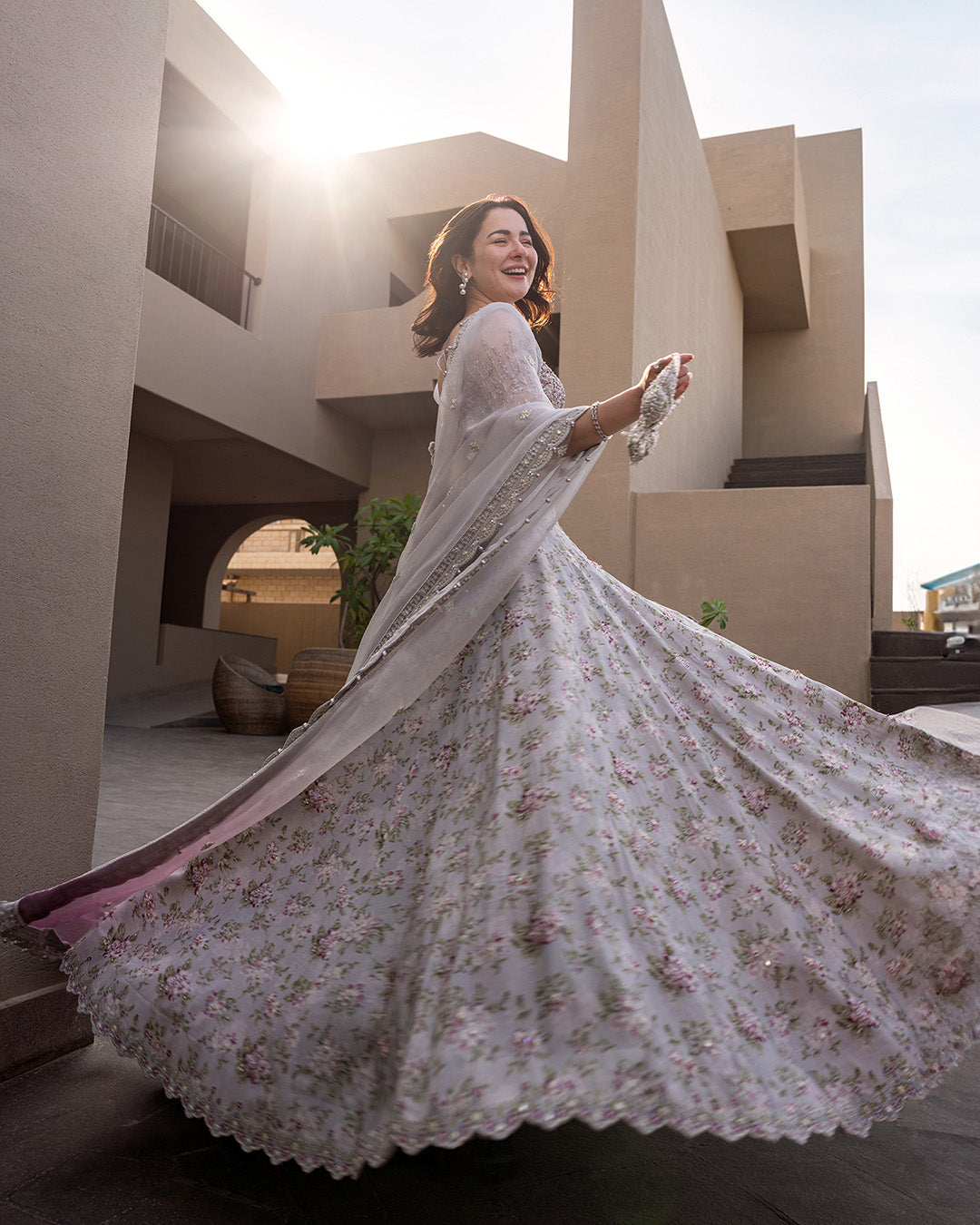 Model Wearing Faiza Saqlain Chanaah Light Grey Lehnga Choli for wedding wear - Pakistani Designer Wear for Women in UK | Kifat