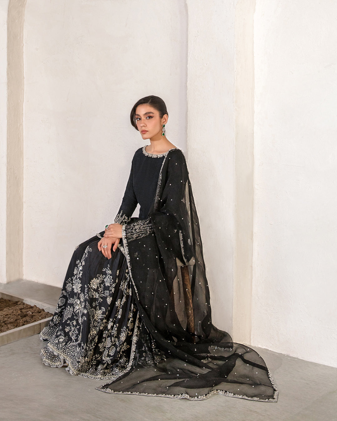 Model Wearing Faiza Saqlain Ciar Black Shirt with Gharara for wedding wear - Pakistani Designer Wear for Women in UK | Kifat