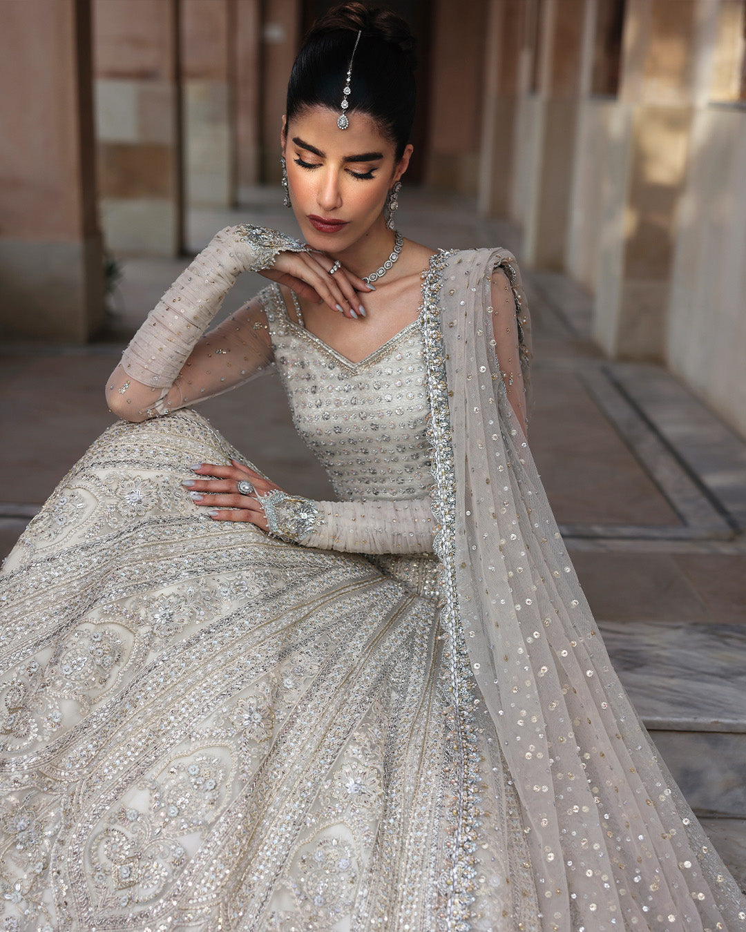 Model Wearing Faiza Saqlain Cammi White Lehnga Choli for wedding wear - Pakistani Designer Wear for Women in UK | Kifat