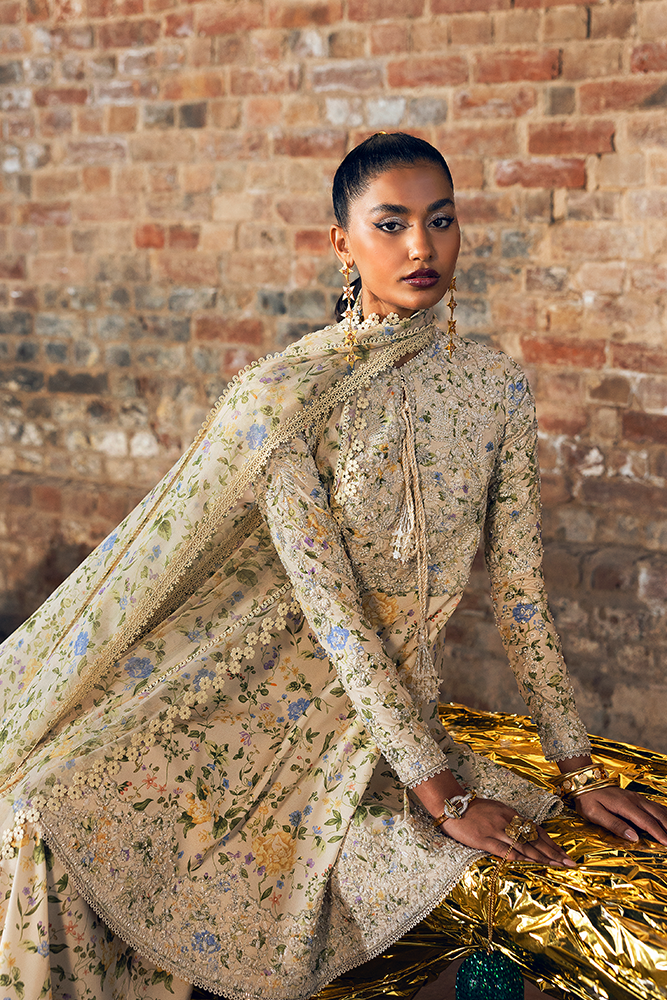 Model Wearing Suffuse by Sana Yasir CARMILLA Ivory peplum with sharara for Formal Events- Pakistani Designer wear for Women in UK | Kifat