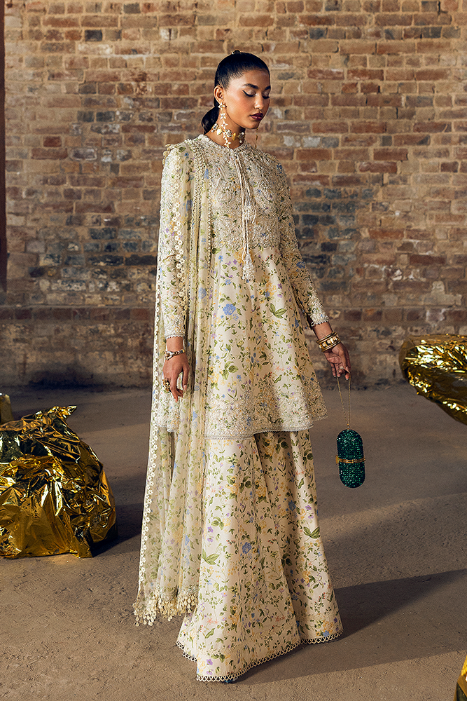 Model Wearing Suffuse by Sana Yasir CARMILLA Ivory peplum with sharara for Formal Events- Pakistani Designer wear for Women in UK | Kifat
