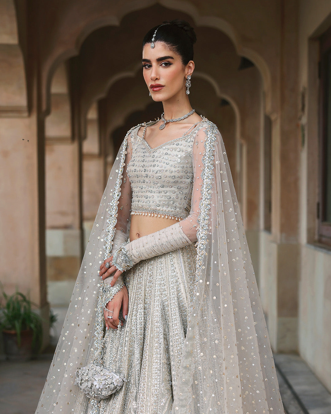 Model Wearing Faiza Saqlain Cammi White Lehnga Choli for wedding wear - Pakistani Designer Wear for Women in UK | Kifat