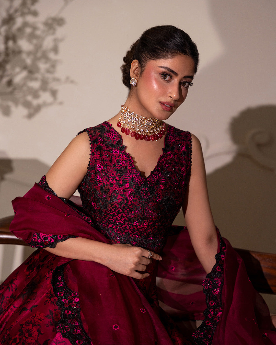 Model Wearing Faiza Saqlain Havin Dark Magenta Pink Shirt with Lehnga for wedding wear - Pakistani Designer Wear for Women in UK | Kifat
