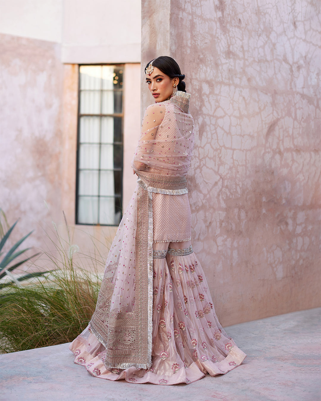 Model Wearing Faiza Saqlain Eilees Powder Pink Shirt with Gharara for wedding wear - Pakistani Designer Wear for Women in UK | Kifat