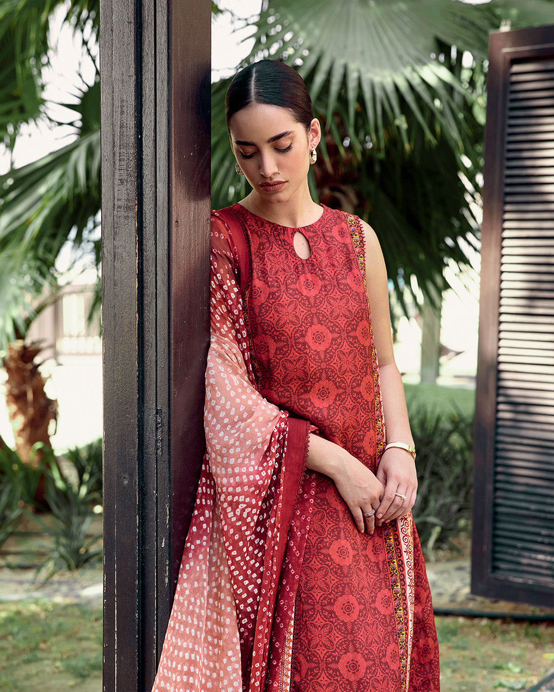 Model Wearing Faiza Saqlain Gloriana Red Shirt with Churidar for Ladies wear - Pakistani Designer Wear for Women in UK | Kifat