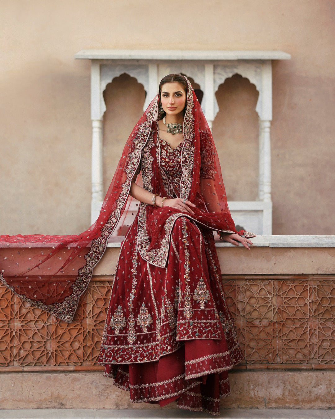 Model Wearing Faiza Saqlain Zelia Red Kalidaar for wedding wear - Pakistani Designer Wear for Women in UK | Kifat