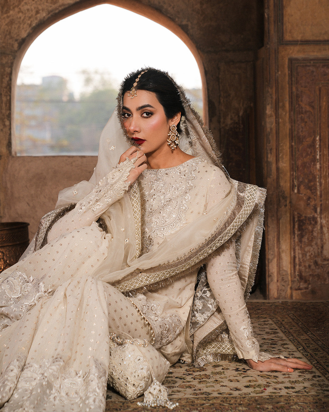 Model Wearing Faiza Saqlain Devina Off-White Shirt with Gharara for wedding wear - Pakistani Designer Wear for Women in UK | Kifat
