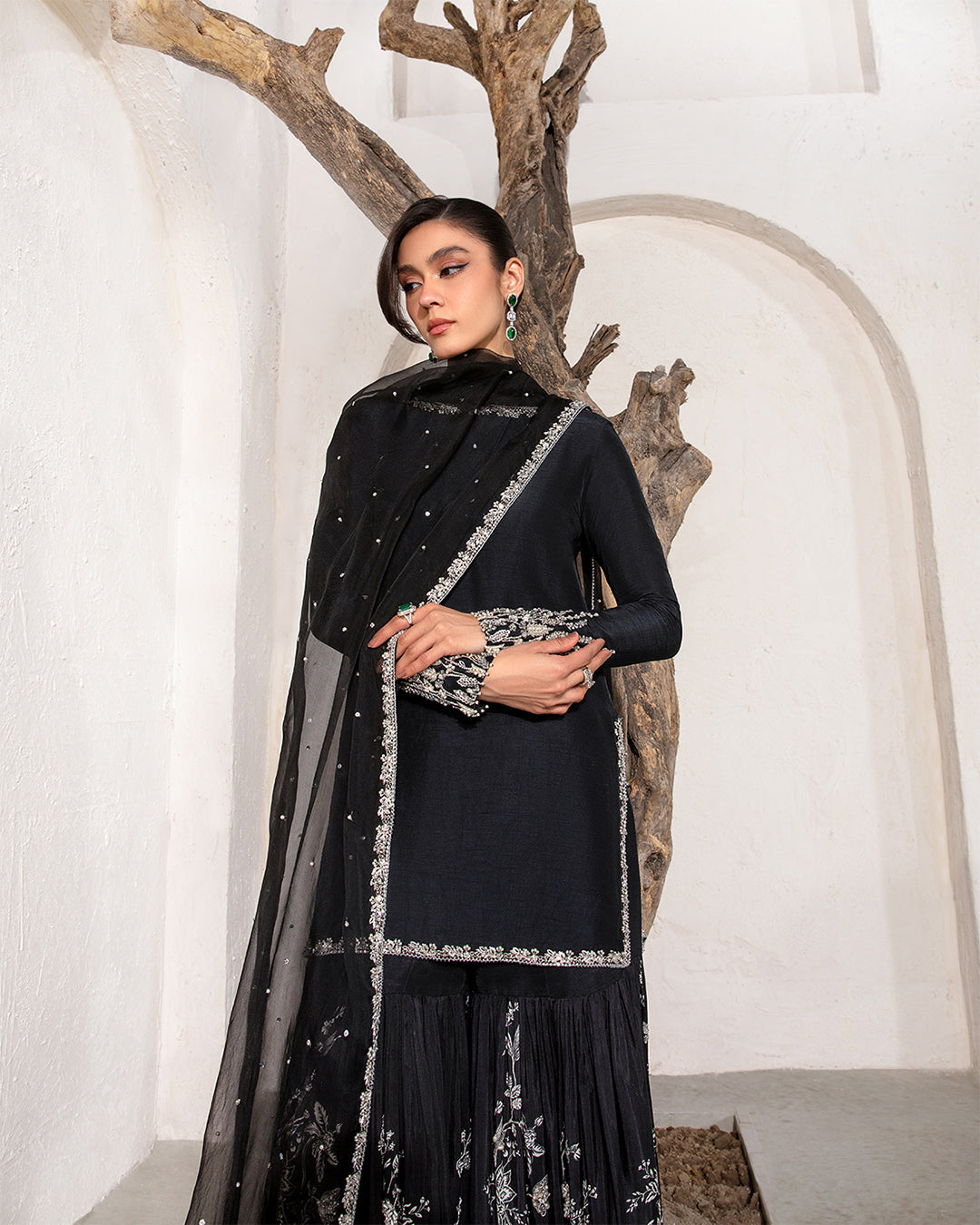 Model Wearing Faiza Saqlain Ciar Black Shirt with Gharara for wedding wear - Pakistani Designer Wear for Women in UK | Kifat