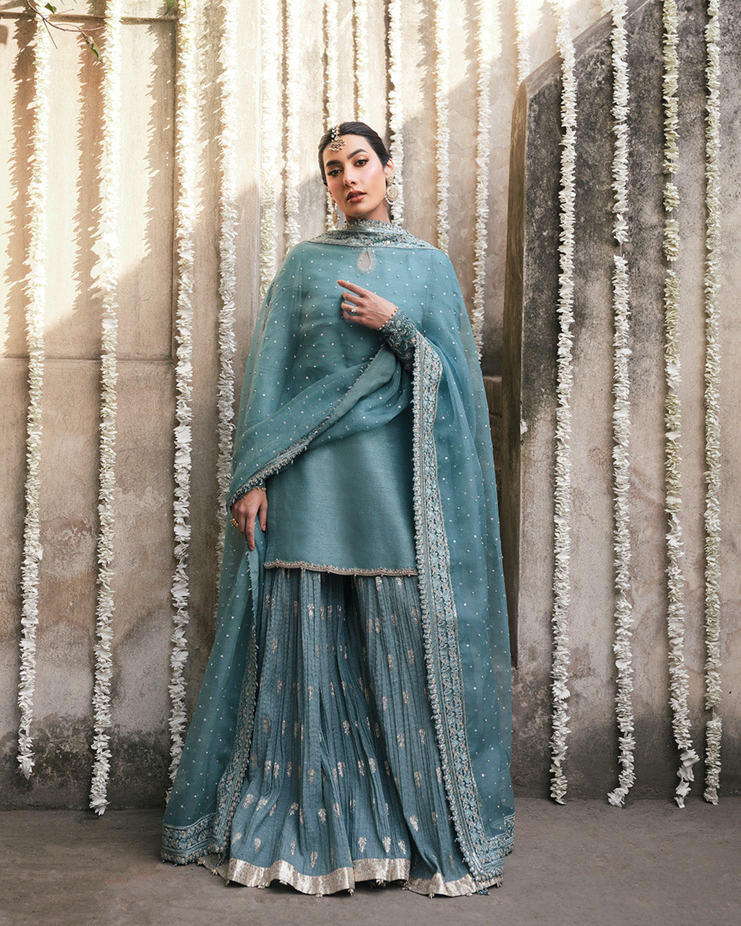 Model Wearing Faiza Saqlain Tisha Cadet Blue Shirt with Sharara for wedding wear - Pakistani Designer Wear for Women in UK | Kifat