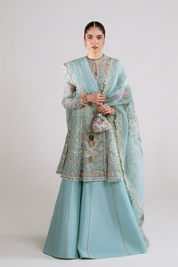 Model Wearing Suffuse by Sana Yasir Illyra Aquamarine Angrakha with Sharara Pants for Wedding Wear - Pakistani Designer wear for Women in UK | Kifat
