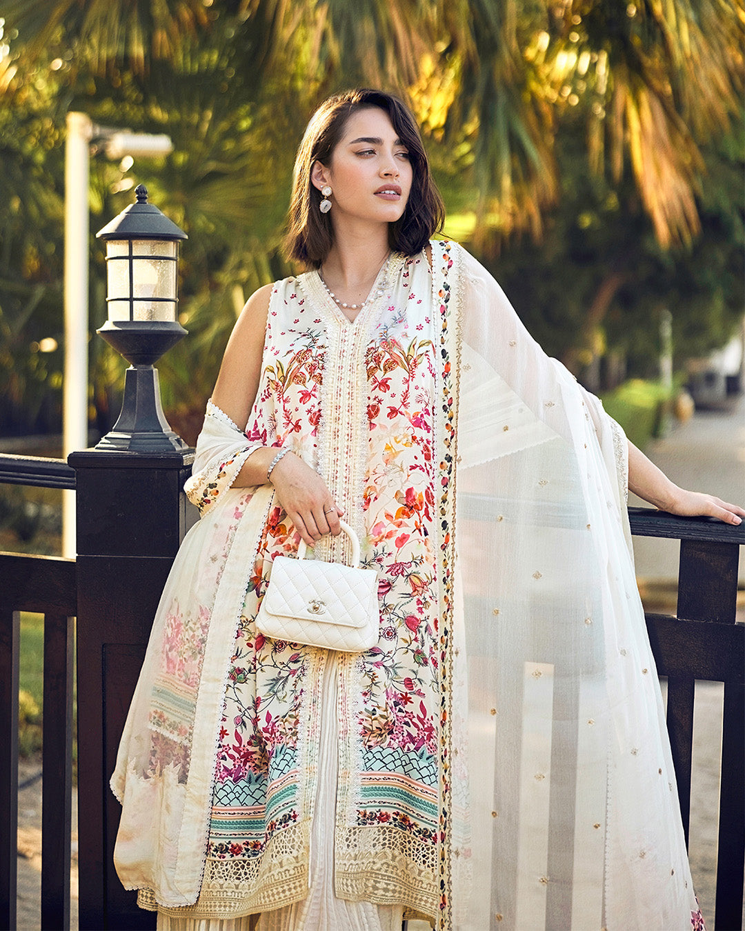 Model Wearing Faiza Saqlain Beldene Off-White Shirt with Sharara for Ladies wear - Pakistani Designer Wear for Women in UK | Kifat