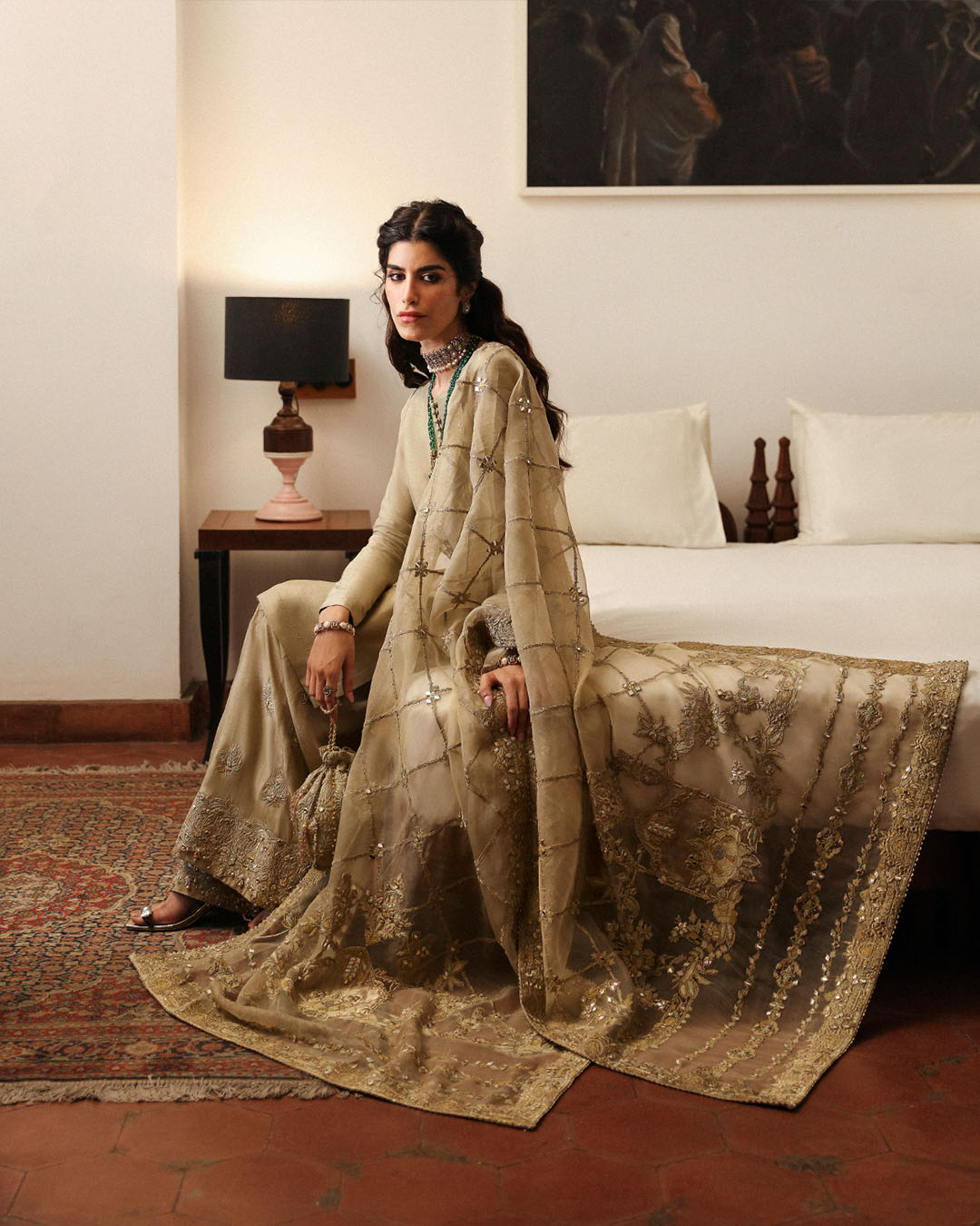 Model Wearing Faiza Saqlain Nainsi Gold Shirt with Flared Pants for formal events wear - Pakistani Designer Wear for Women in UK | Kifat
