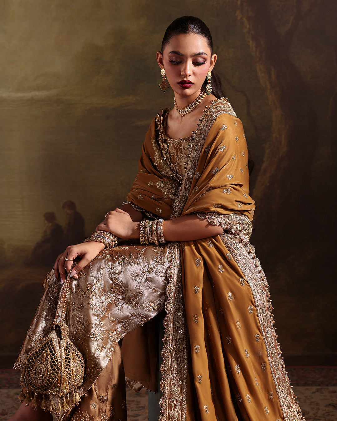 Model Wearing Faiza Saqlain Reit Mustard Gold Hue Shirt with Trouser for wedding wear - Pakistani Designer Wear for Women in UK | Kifat