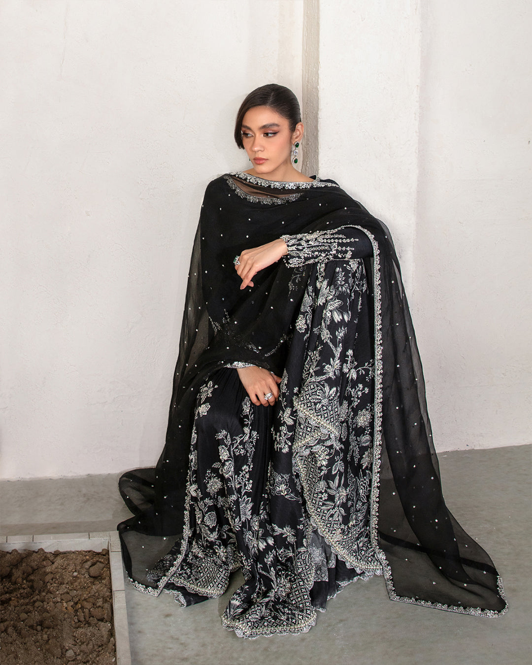Model Wearing Faiza Saqlain Ciar Black Shirt with Gharara for wedding wear - Pakistani Designer Wear for Women in UK | Kifat