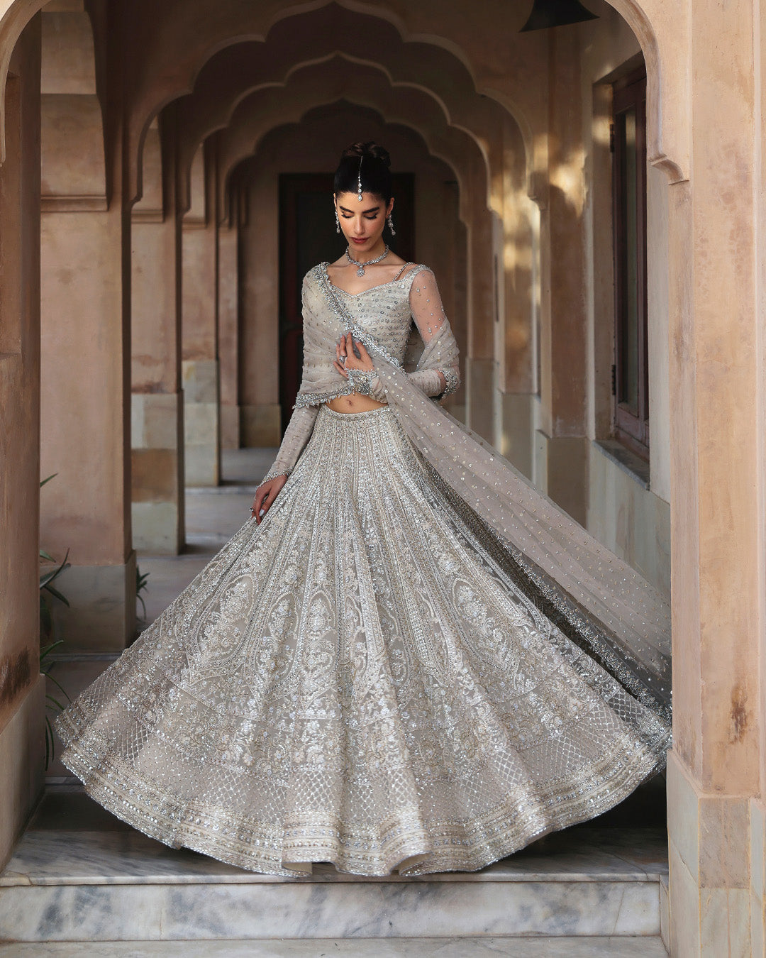 Model Wearing Faiza Saqlain Cammi White Lehnga Choli for wedding wear - Pakistani Designer Wear for Women in UK | Kifat
