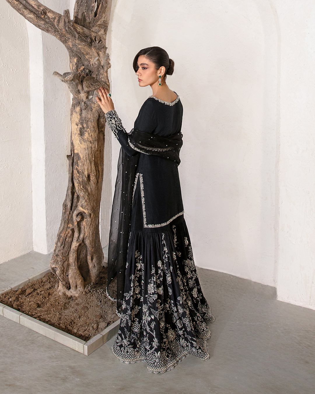 Model Wearing Faiza Saqlain Ciar Black Shirt with Gharara for wedding wear - Pakistani Designer Wear for Women in UK | Kifat