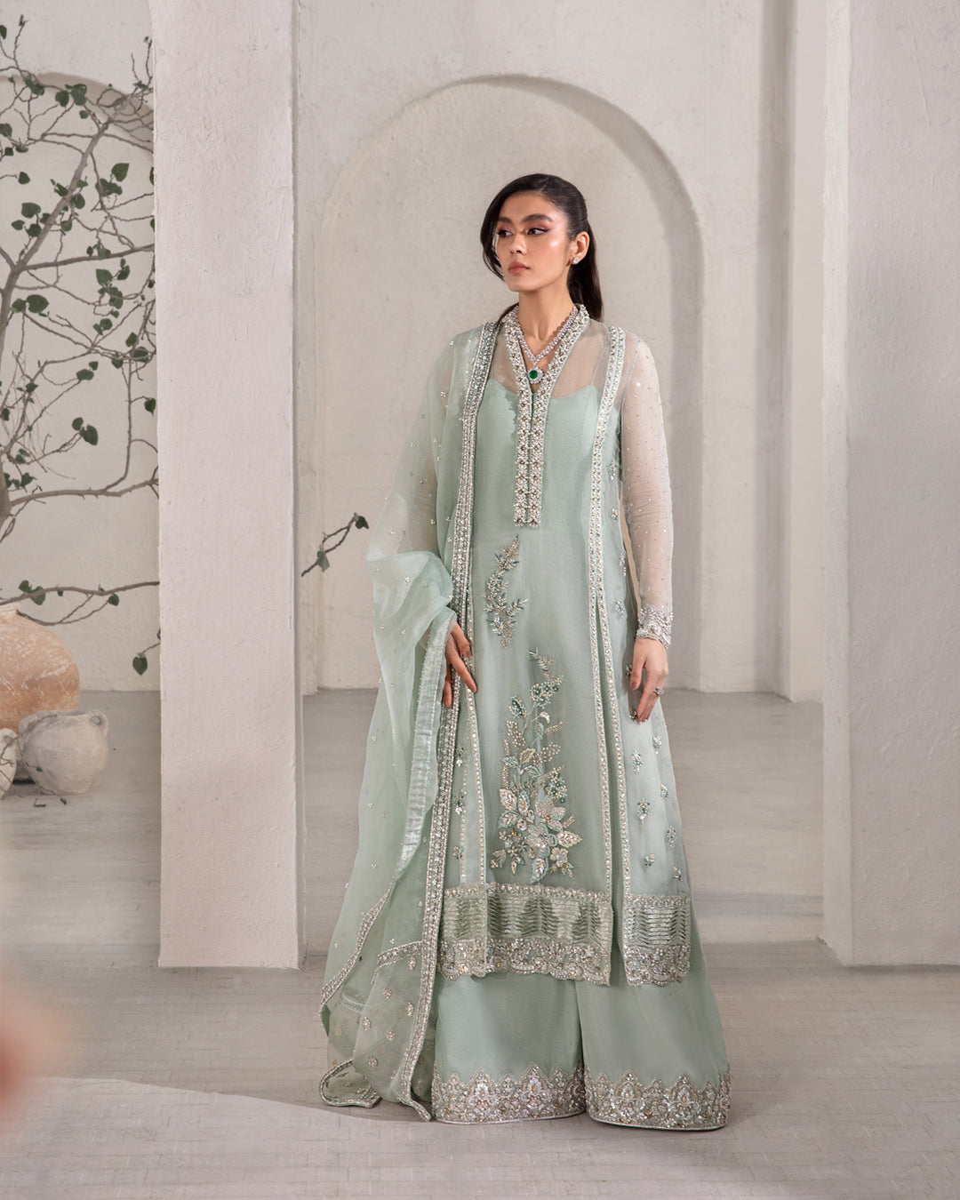 Model Wearing Faiza Saqlain Marvela Ice Blue Shirt with Flared Pants for formal events wear - Pakistani Designer Wear for Women in UK | Kifat