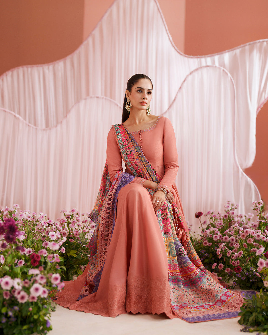 Women Wearing Muzn Coral Pishwas for Luxury Events - Pakistani Designer Wear for Women in UK | Kifat