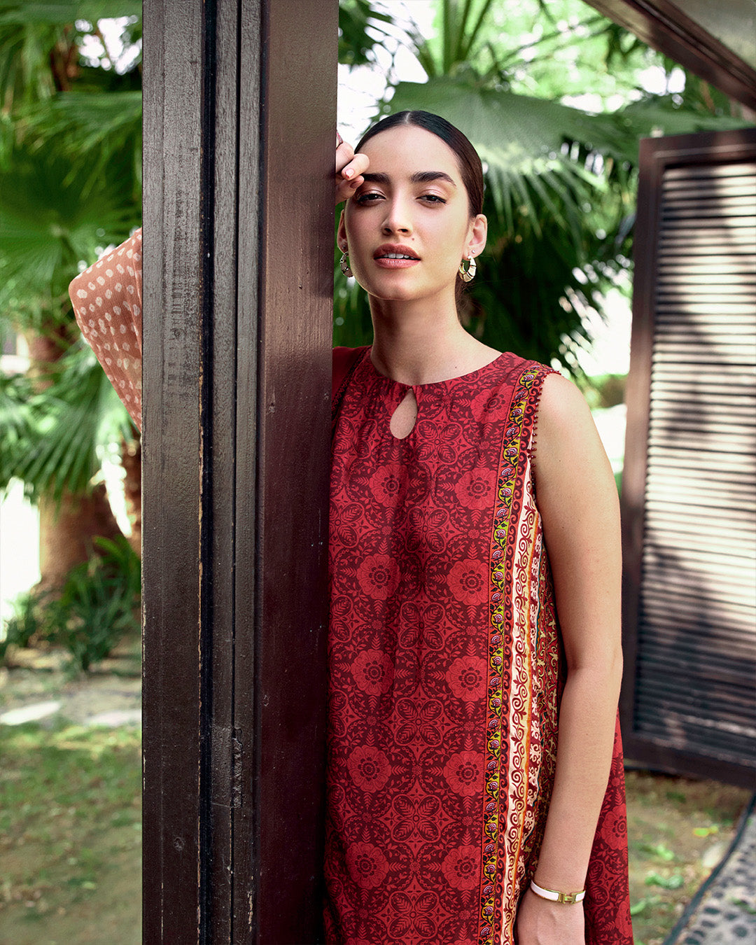 Model Wearing Faiza Saqlain Gloriana Red Shirt with Churidar for Ladies wear - Pakistani Designer Wear for Women in UK | Kifat