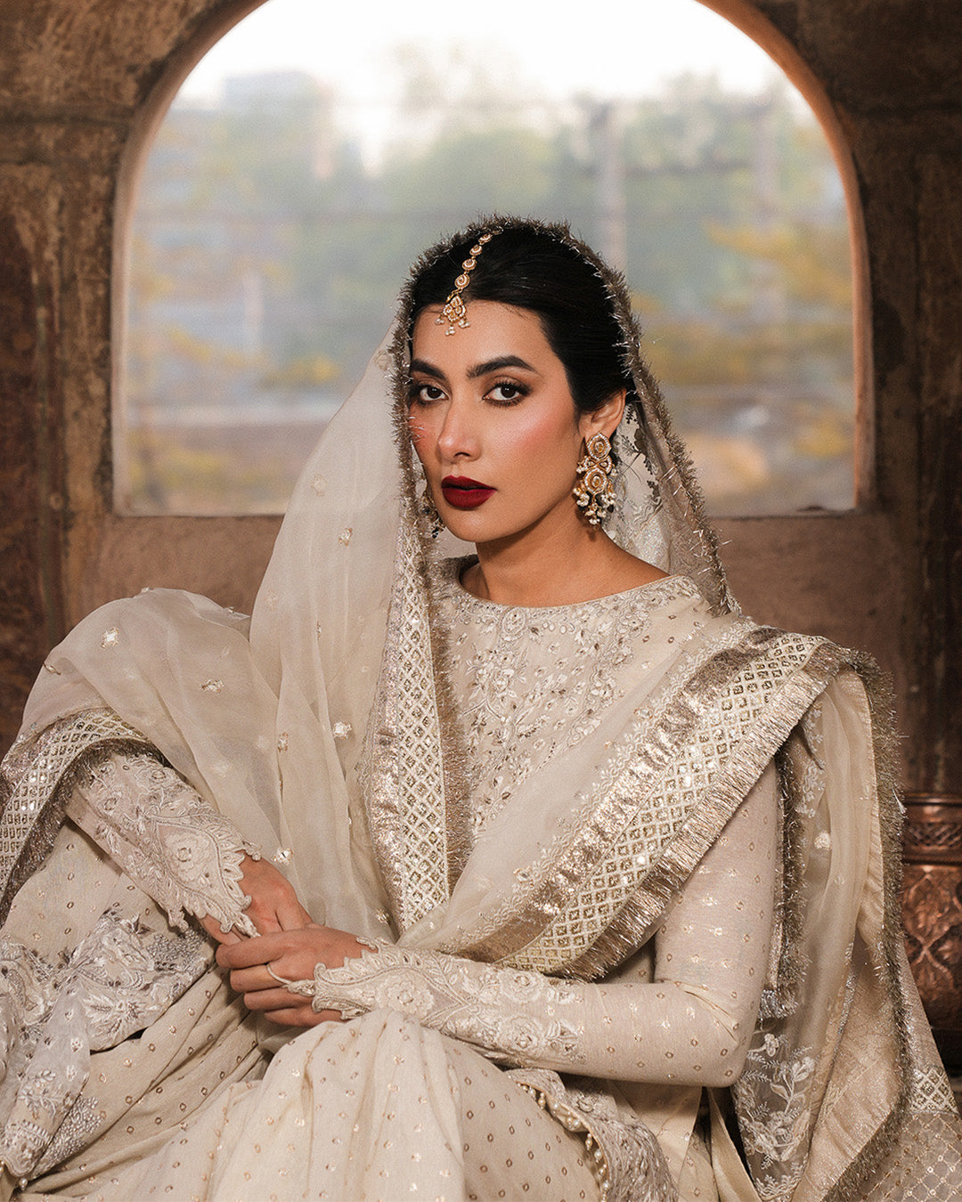 Model Wearing Faiza Saqlain Devina Off-White Shirt with Gharara for wedding wear - Pakistani Designer Wear for Women in UK | Kifat