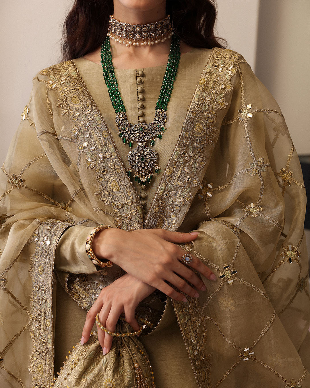 Model Wearing Faiza Saqlain Nainsi Gold Shirt with Flared Pants for formal events wear - Pakistani Designer Wear for Women in UK | Kifat