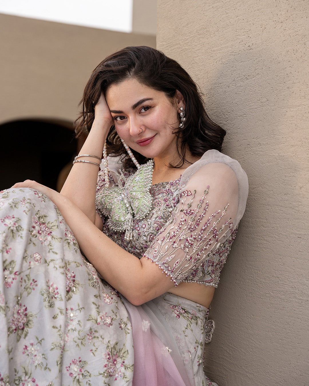 Model Wearing Faiza Saqlain Chanaah Light Grey Lehnga Choli for wedding wear - Pakistani Designer Wear for Women in UK | Kifat