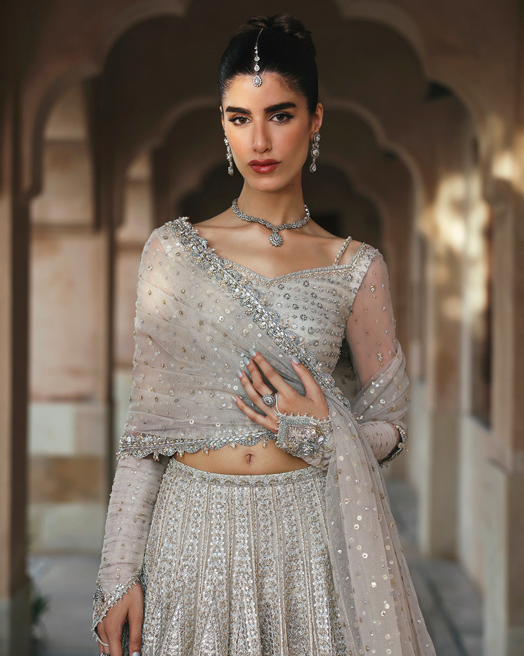 Model Wearing Faiza Saqlain Cammi White Lehnga Choli for wedding wear - Pakistani Designer Wear for Women in UK | Kifat