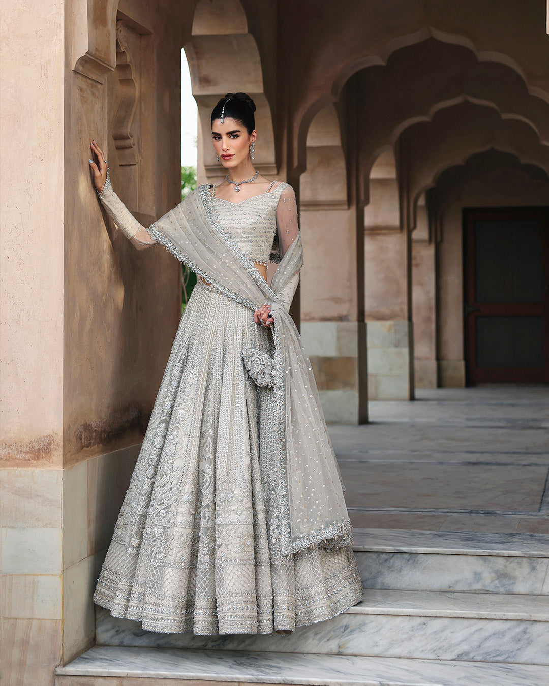 Model Wearing Faiza Saqlain Cammi White Lehnga Choli for wedding wear - Pakistani Designer Wear for Women in UK | Kifat