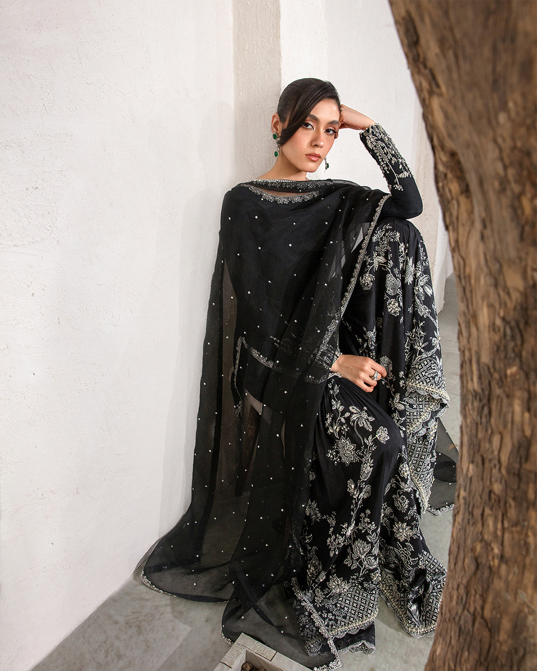 Model Wearing Faiza Saqlain Ciar Black Shirt with Gharara for wedding wear - Pakistani Designer Wear for Women in UK | Kifat