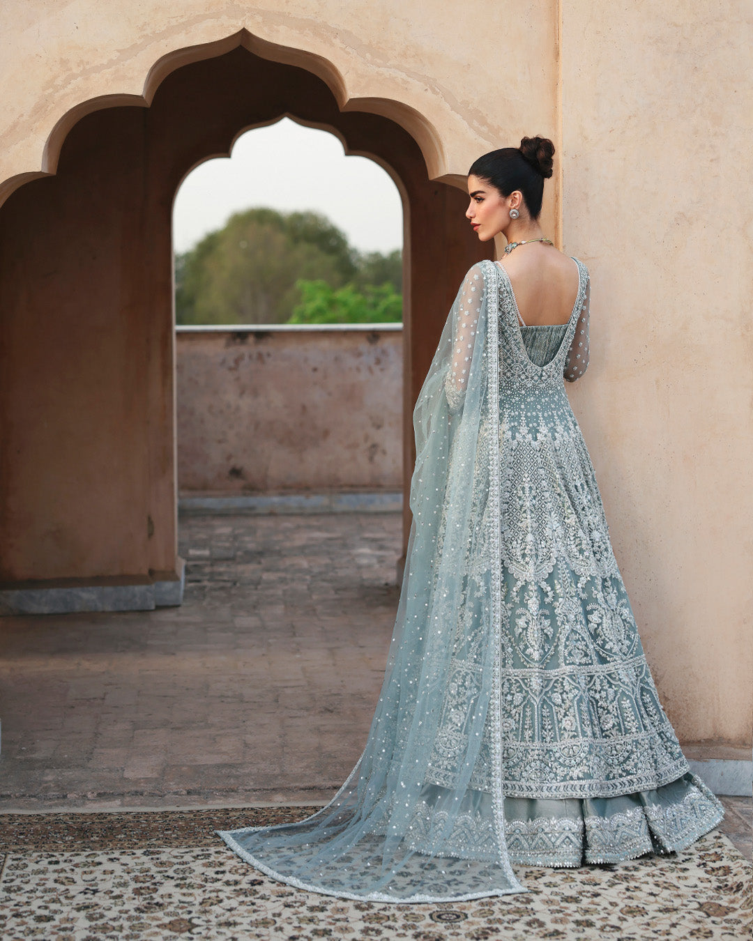 Model Wearing Faiza Saqlain Dorien Mint Blue Pishwas with Lehnga for wedding wear - Pakistani Designer Wear for Women in UK | Kifat