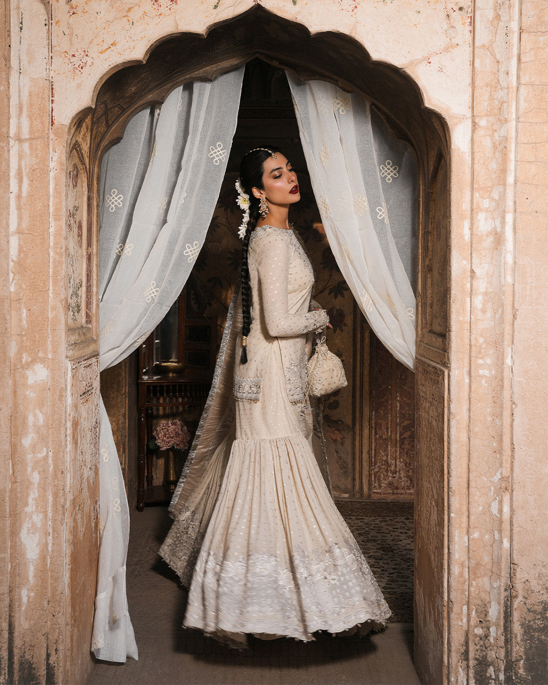 Model Wearing Faiza Saqlain Devina Off-White Shirt with Gharara for wedding wear - Pakistani Designer Wear for Women in UK | Kifat