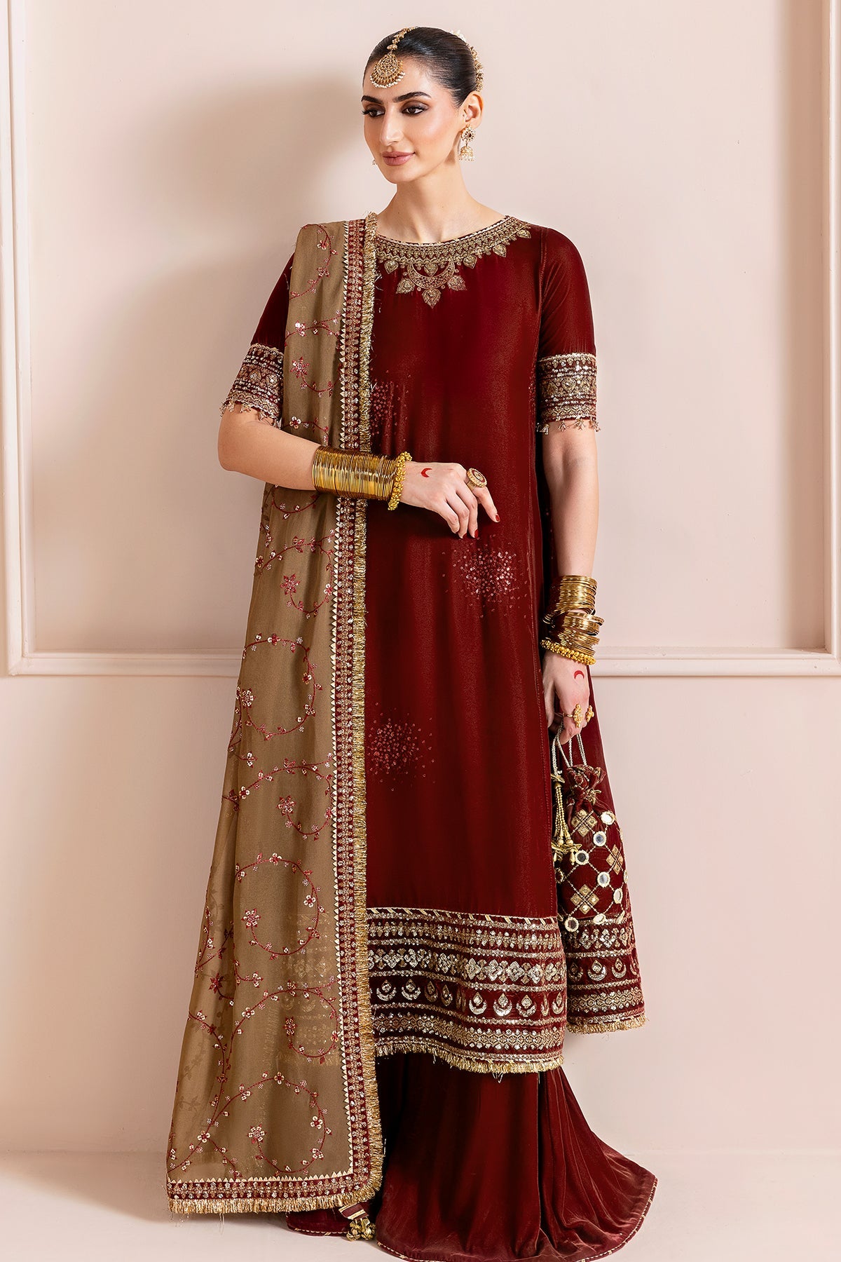 Women Wearing Embroidered Velvet Formal CVF D-13 Rust Long Shirt with Sharara for Wedding Events - Pakistani Designer Wear for Women in UK | Kifat