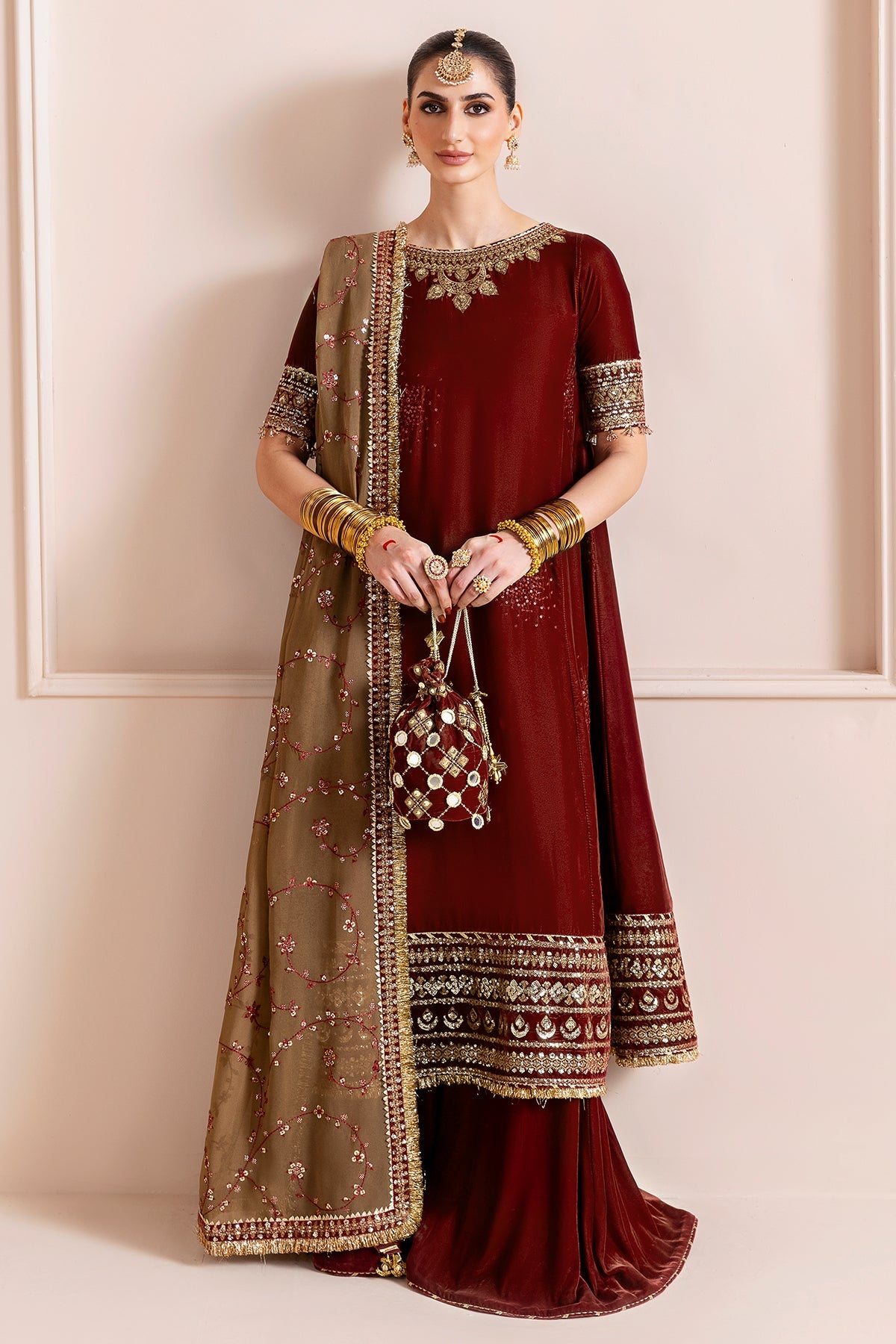 Women Wearing Embroidered Velvet Formal CVF D-13 Rust Long Shirt with Sharara for Wedding Events - Pakistani Designer Wear for Women in UK | Kifat